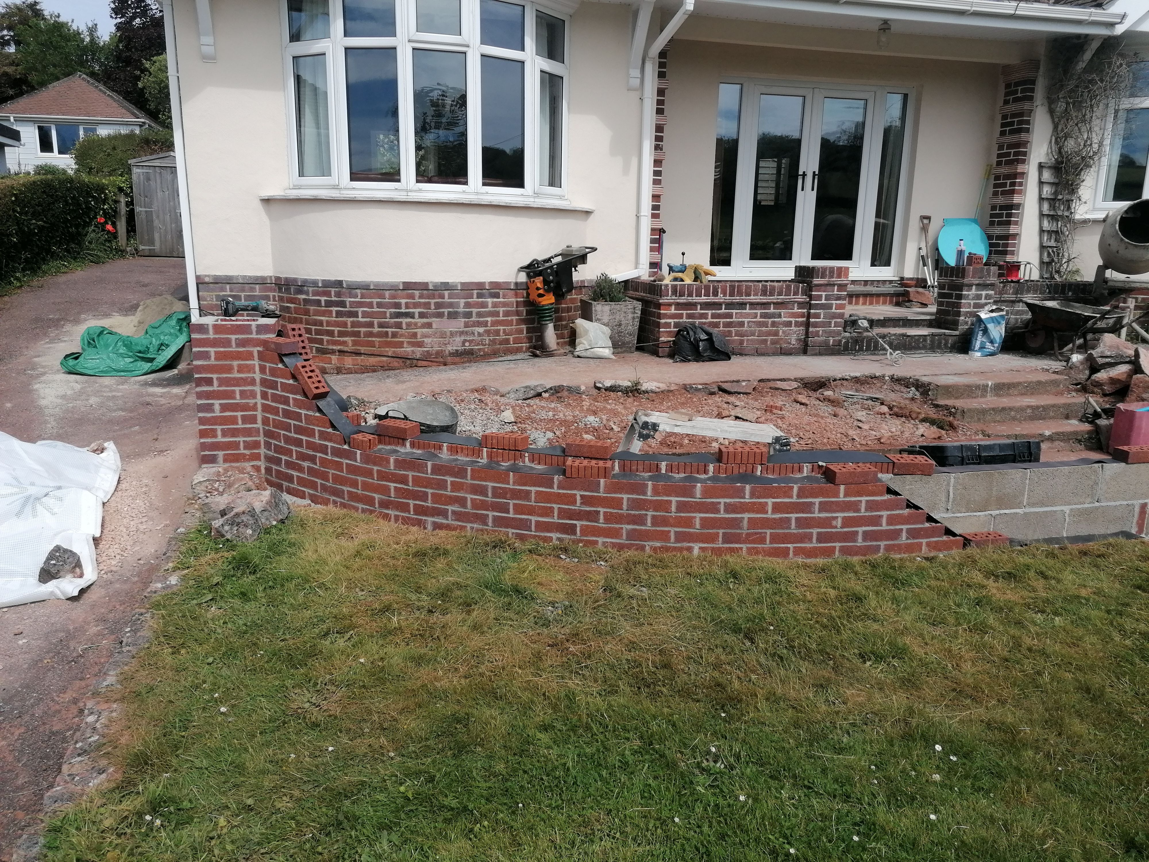 Wall covered up so rain doesn't penetrate the brickwork