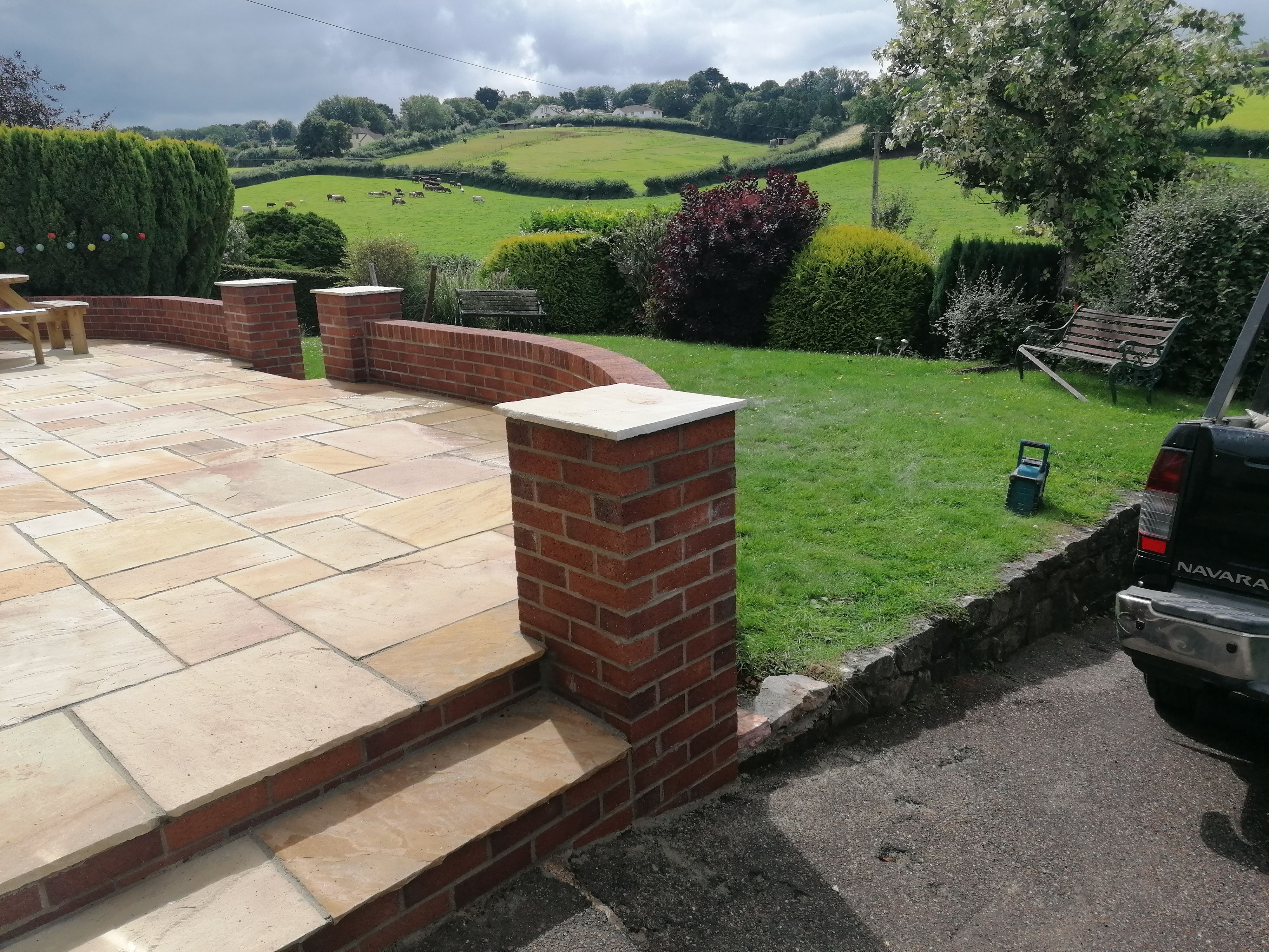 Completed curved brickwork and patio
