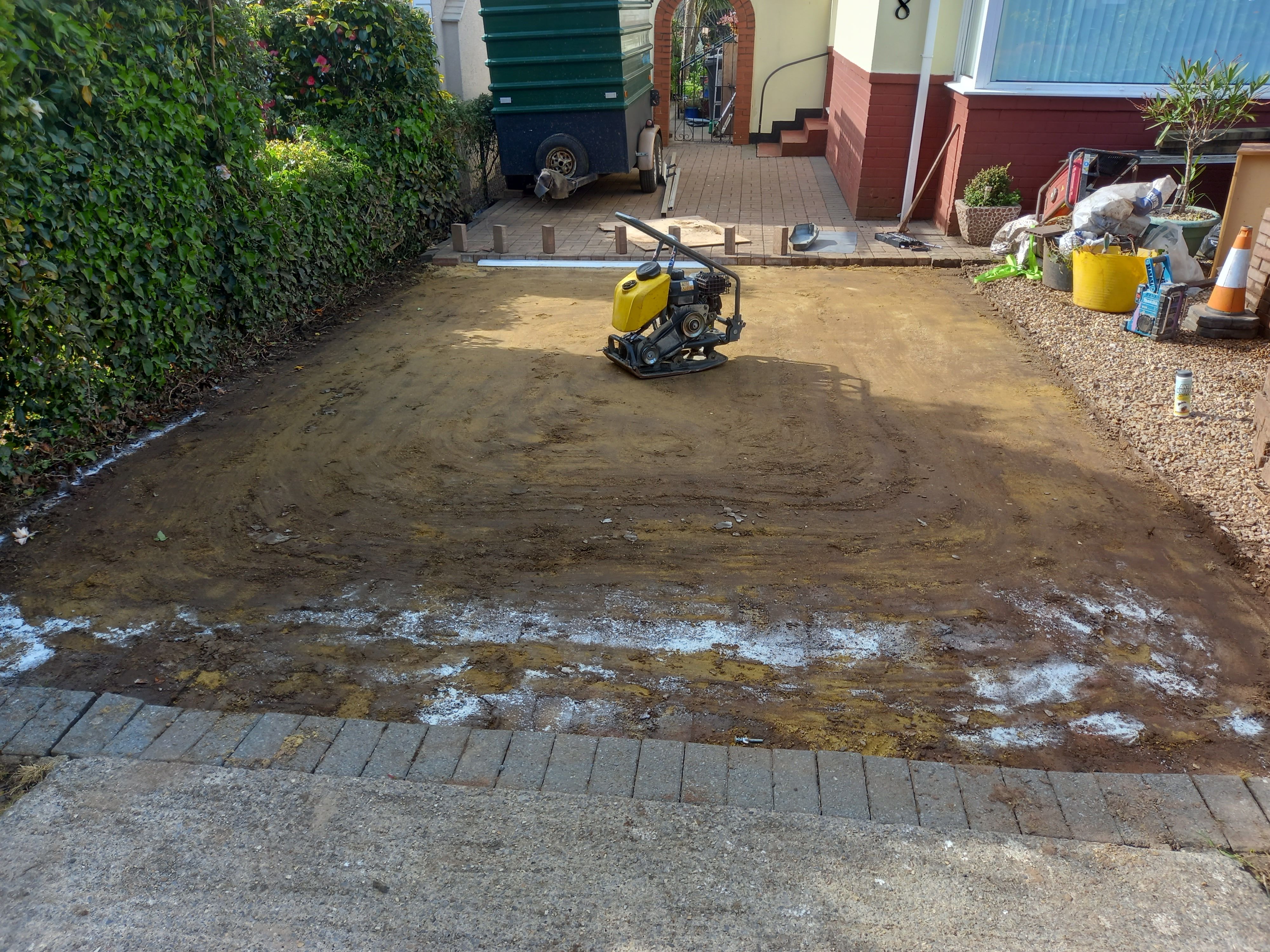 Pavers lifted and ant powder down on sand