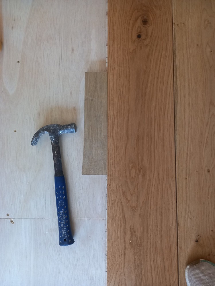 Positioning boards before nailing with sacrificial 