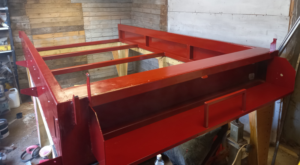 CNC machine painted with red primer