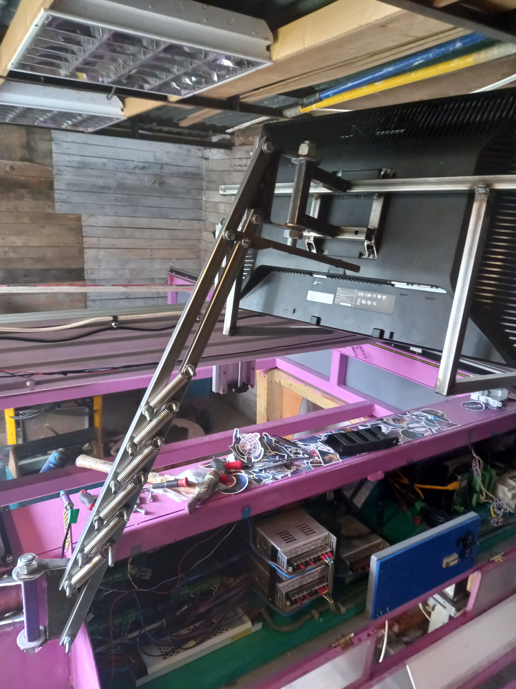 Monitor arm bracket in up position
